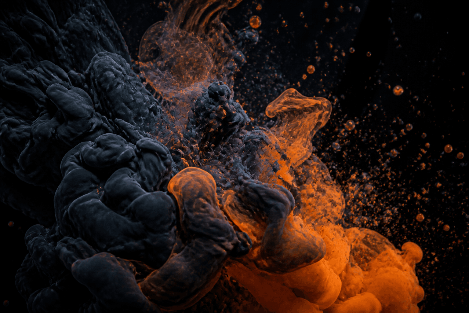 Ink and papaya pigment blooming in water